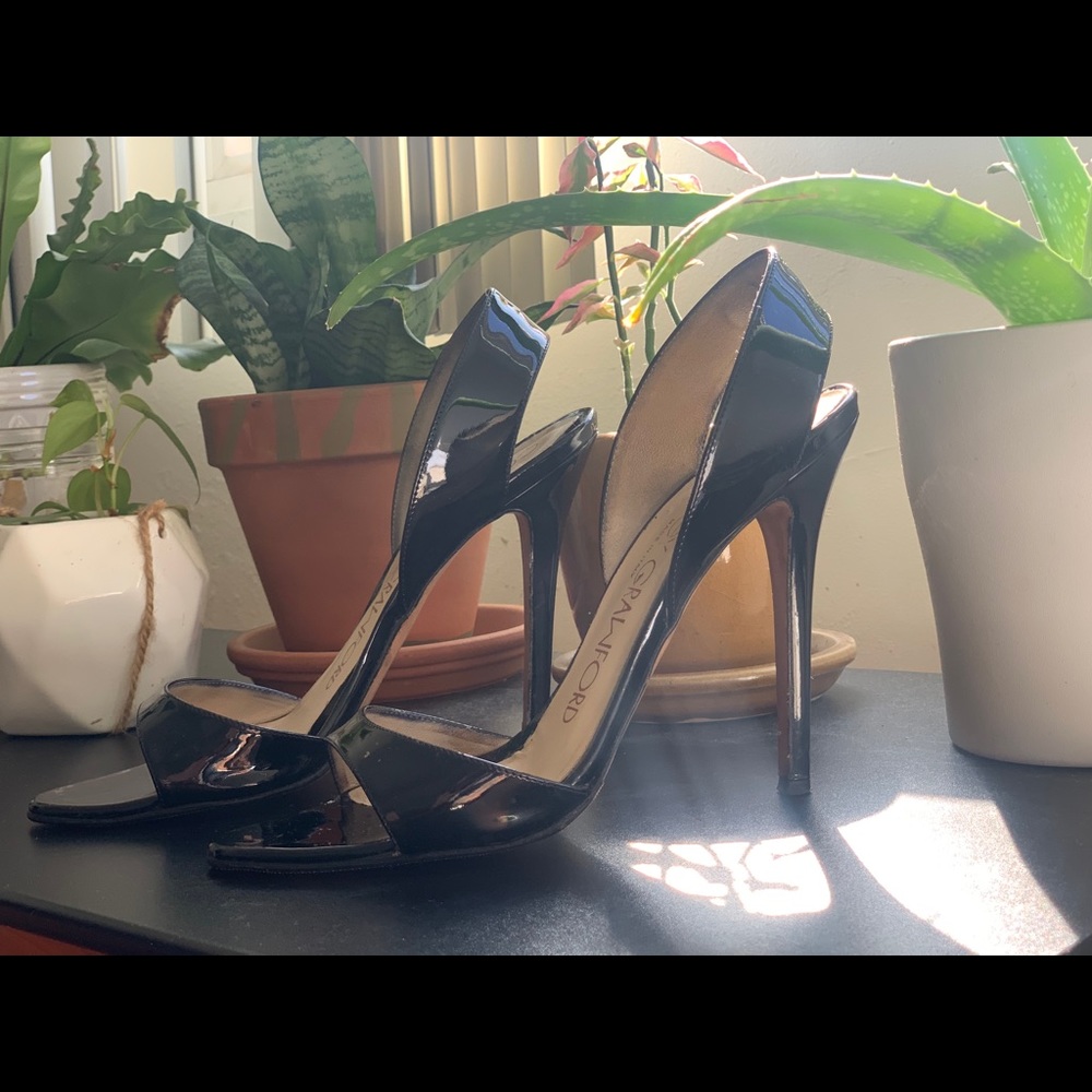 Courtney Crawford’s sexy patent leather sandal.